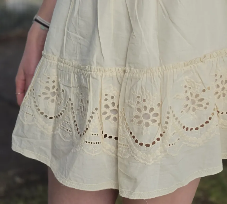 Pearl Eyelet Mini Skirt — Floral cutwork detail